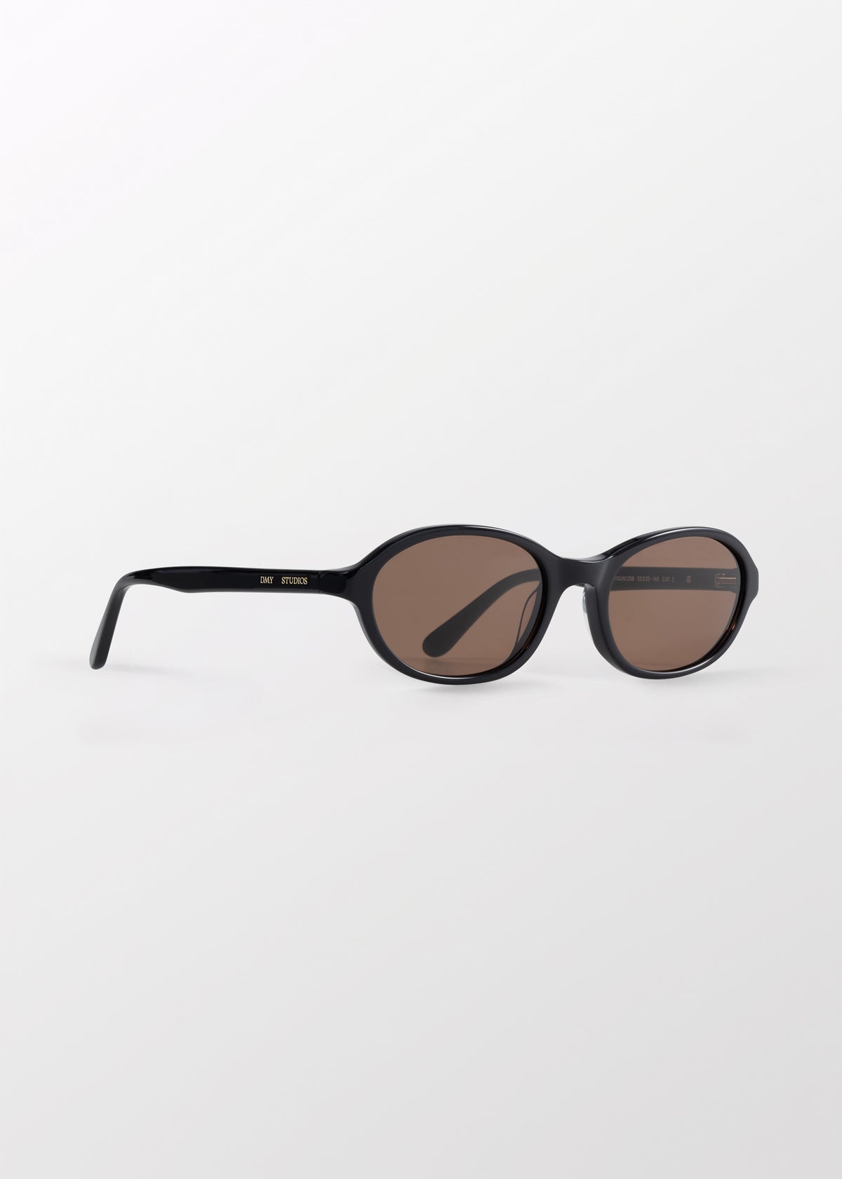 Bibi Black Sunglasses by DMY Studios with brown tinted lenses.