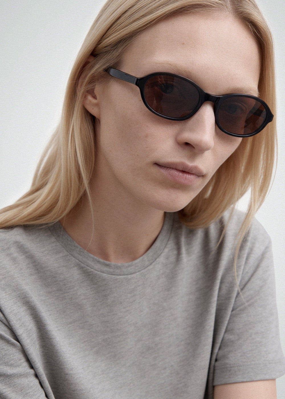 A model wearing Bibi Black sunglasses by DMY Studios.