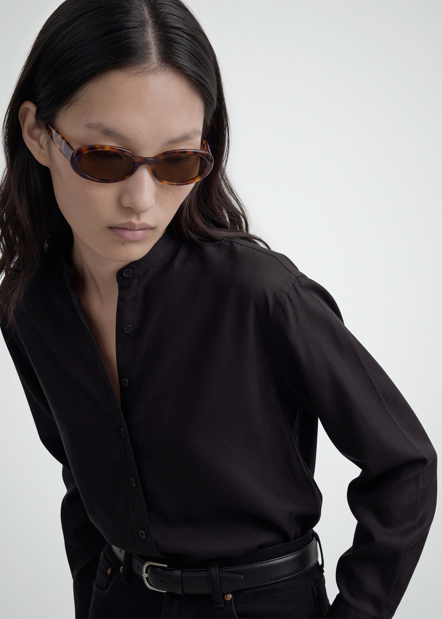 A model wearing Valentina Havana sunglasses by DMY Studios.